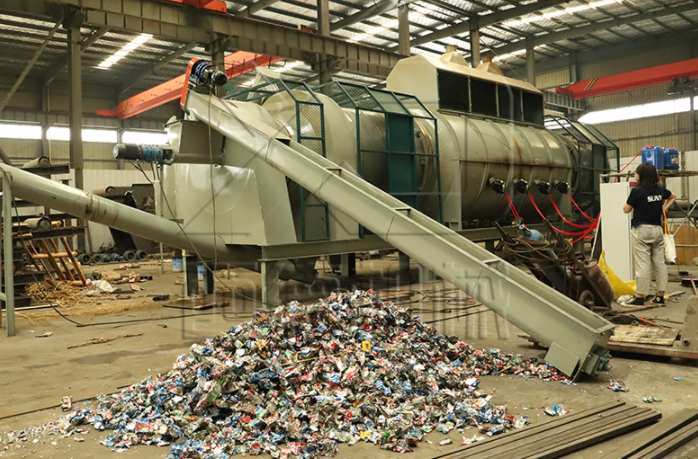 利用連續(xù)式滾筒碳化爐，易拉罐脫漆更便捷